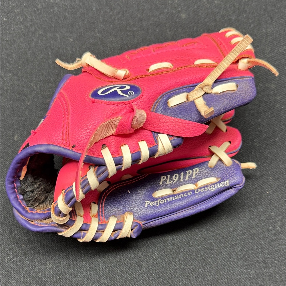 Rawlings pink and Purple Glove with white Laces. Tball size